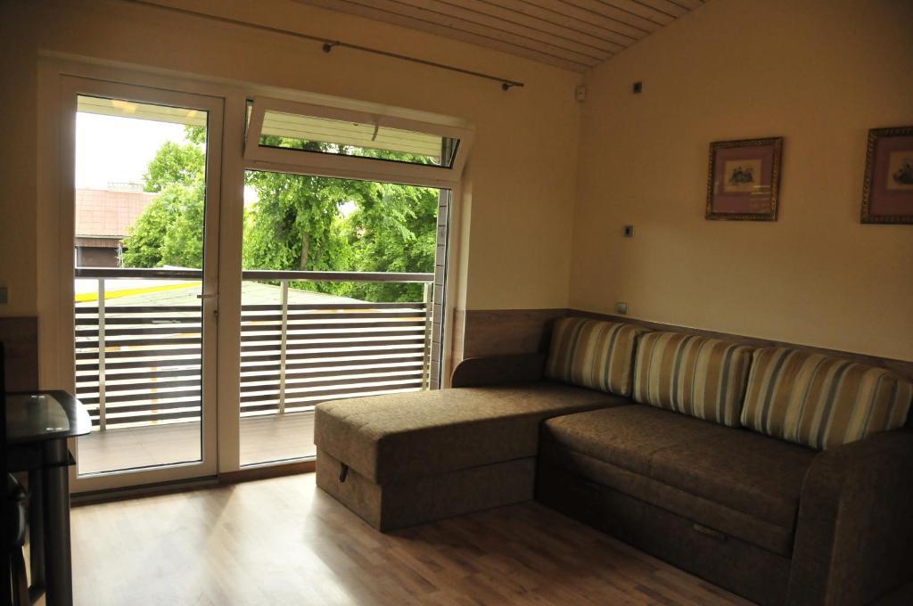 Apartamentai Trys Pusys Sventoji Bilik gambar
