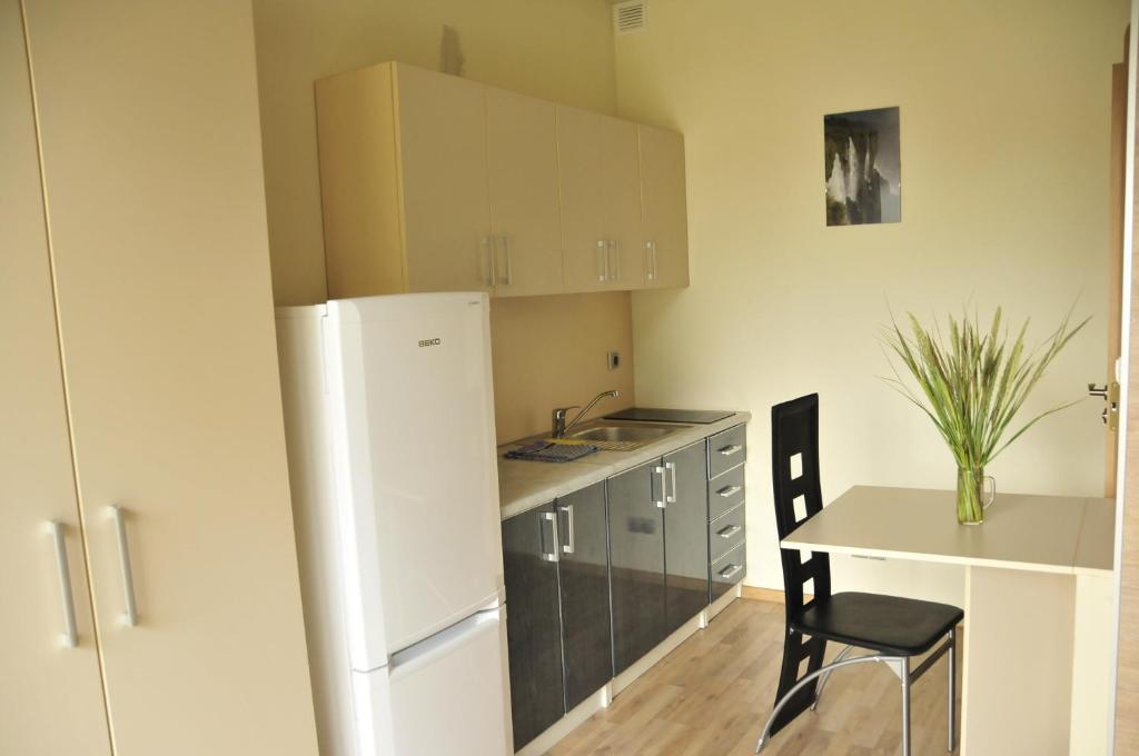 Apartamentai Trys Pusys Sventoji Bilik gambar